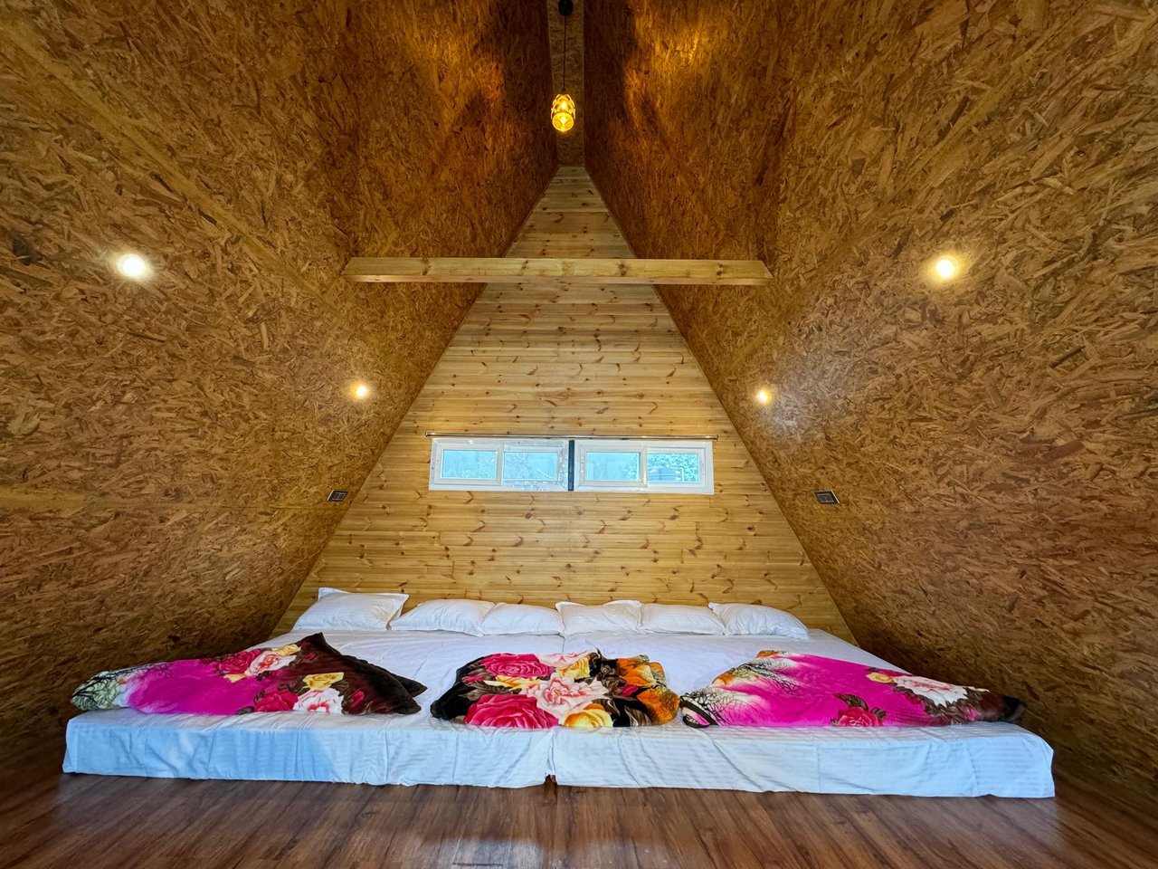 A-frame loft sleeping area at Misty Meadows